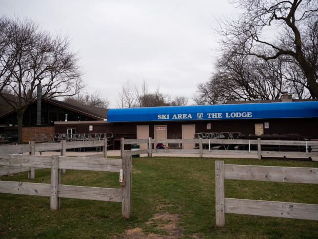 Closed for the season, the ski area and lodge bordering the ski slope at Four Lakes Alpine Snowsports in Lisle sits empty on March 7, 2024.  (Tess Kenny/Naperville Sun)