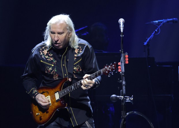 Joe Walsh performing "Nevermind" with the Eagles on March 8, 2024, at the United Center in Chicago.  (John J. Kim/Chicago Tribune)