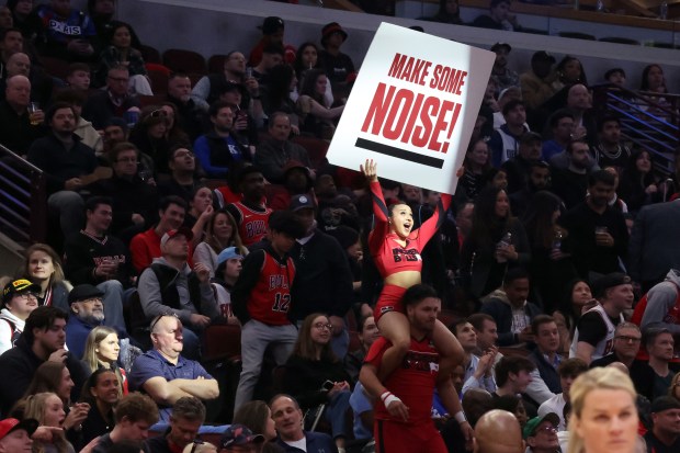 Bulls cheerleaders try to rally fans during the second half against the Mavericks at the United Center in Chicago on March 11, 2024.  (Terrence Antonio James/Chicago Tribune)
