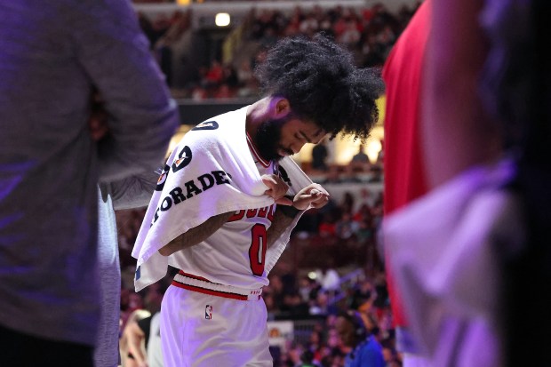 Bulls guard Coby White (0) looks down in the second half against the Mavericks at the United Center in Chicago on March 11, 2024.  Bulls lost 127-92.  (Terrence Antonio James/Chicago Tribune)