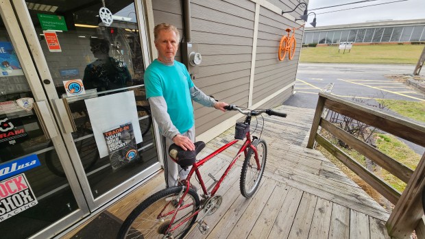 Jake Anderson of Aurora said he rides his bike at least once a week during the winter because of the mild weather.  (For David Sharos/Beacon News)