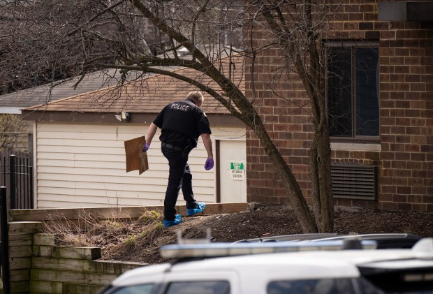 Police are investigating the scene of a fatal domestic violence incident in which a 10-year-old child was fatally injured and a woman was seriously injured in the 5900 block of N Ravenswood in Chicago on Wednesday, March 13, 2024.  (E. Jason Wambsgans/Chicago Tribune)